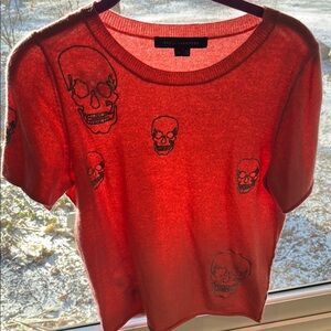 Skull Cashmere t-shirt w/ silver threaded skull pattern.  Hits high on waist.